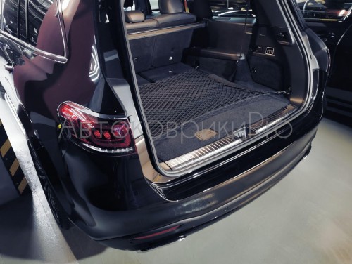 Сетка в багажник Mercedes-Benz GLS 2019- Эластичная текстильная сетка горизонтального крепления, препятствующая скольжению и перемещению предметов в багажном отделении автомобиля.