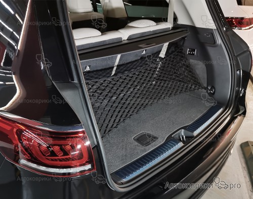 Сетка в багажник автомобиля Mercedes-Benz GLS Эластичная текстильная сетка вертикального крепления, препятствующая скольжению и перемещению предметов в багажном отделении автомобиля.