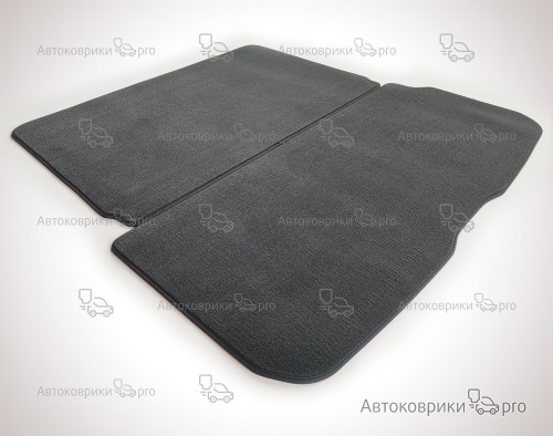 Коврик в багажник Volvo XC90 2015- Текстильный коврик багажника черного, серого, бежевого или коричневого цвета. Резиновая основа обеспечивает полную водонепроницаемость и защиту.