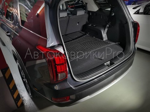 Сетка в багажник Hyundai Palisade 2019- Эластичная текстильная сетка горизонтального крепления, препятствующая скольжению и перемещению предметов в багажном отделении автомобиля.