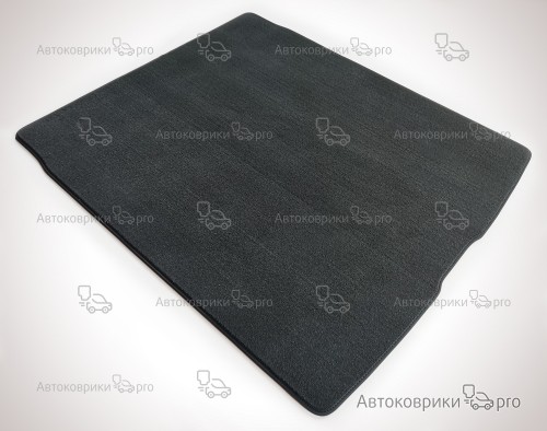 Коврик в багажник BMW 5 серии 2023- Текстильный коврик багажника черного, серого, бежевого или коричневого цвета. Резиновая основа обеспечивает полную водонепроницаемость и защиту.