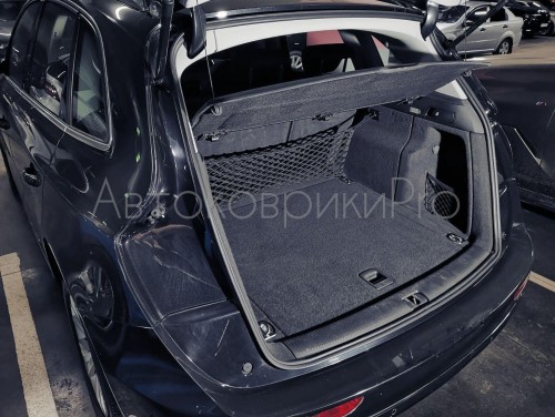 Сетка в багажник Audi Q5 2008-2017 Эластичная текстильная сетка вертикального крепления, препятствующая скольжению и перемещению предметов в багажном отделении автомобиля.