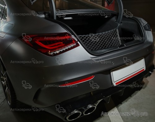 Сетка в багажник Mercedes-Benz CLA 2019- Эластичная текстильная сетка вертикального крепления, препятствующая скольжению и перемещению предметов в багажном отделении автомобиля.