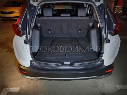 Сетка в багажник Honda CR-V 2017-2023 Эластичная текстильная сетка горизонтального крепления, препятствующая скольжению и перемещению предметов в багажном отделении автомобиля.