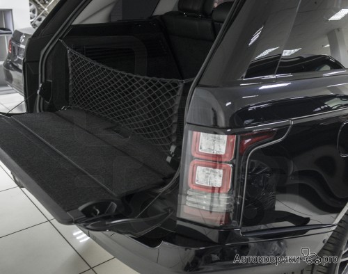 Сетка в багажник Range Rover 2012-2022 Эластичная текстильная сетка вертикального крепления, препятствующая скольжению и перемещению предметов в багажном отделении автомобиля.