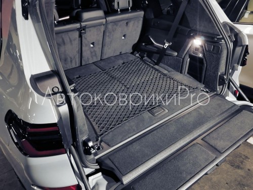Сетка в багажник BMW X7 2019- Эластичная текстильная сетка горизонтального крепления, препятствующая скольжению и перемещению предметов в багажном отделении автомобиля.