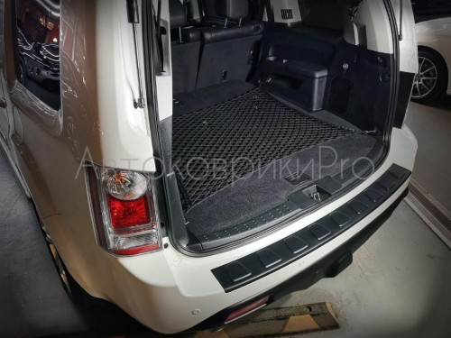 Сетка в багажник Honda Pilot 2008-2015 Эластичная текстильная сетка горизонтального крепления, препятствующая скольжению и перемещению предметов в багажном отделении автомобиля.