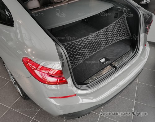 Сетка в багажник BMW 6 серии GT 2017- Эластичная текстильная сетка вертикального крепления, препятствующая скольжению и перемещению предметов в багажном отделении автомобиля.
