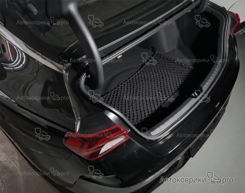 Сетка в багажник автомобиля Kia K5 2020- Эластичная текстильная сетка горизонтального крепления, препятствующая скольжению и перемещению предметов в багажном отделении автомобиля.