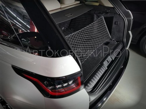 Сетка в багажник Range Rover Sport 2013-2022 Эластичная текстильная сетка вертикального крепления, препятствующая скольжению и перемещению предметов в багажном отделении автомобиля.