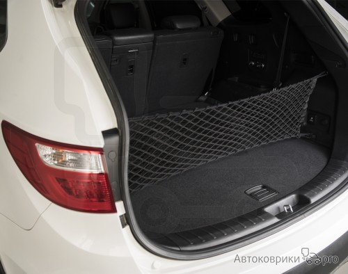 Сетка в багажник Hyundai Santa Fe 2012-2018 Эластичная текстильная сетка вертикального крепления, препятствующая скольжению и перемещению предметов в багажном отделении автомобиля.