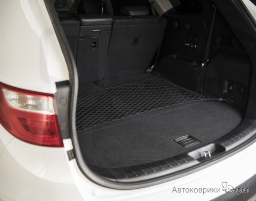 Сетка в багажник Hyundai Santa Fe 2012-2018 Эластичная текстильная сетка горизонтального крепления, препятствующая скольжению и перемещению предметов в багажном отделении автомобиля.
