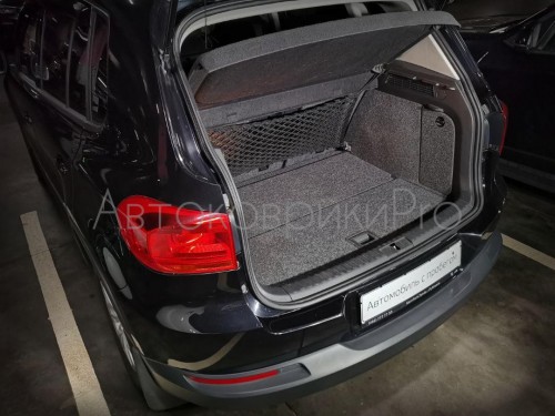 Сетка в багажник Volkswagen Tiguan 2008-2016 Эластичная текстильная сетка вертикального крепления, препятствующая скольжению и перемещению предметов в багажном отделении автомобиля.