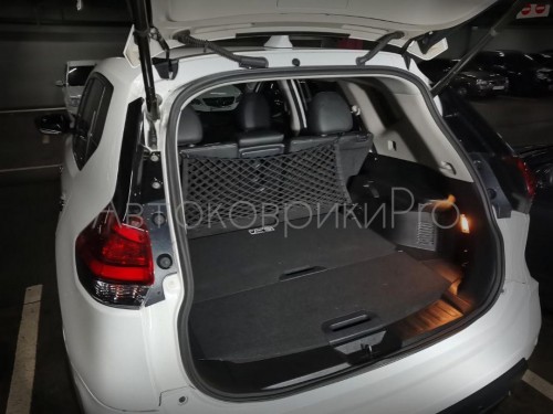 Сетка в багажник Nissan X-Trail 2014-2022 Эластичная текстильная сетка вертикального крепления, препятствующая скольжению и перемещению предметов в багажном отделении автомобиля.