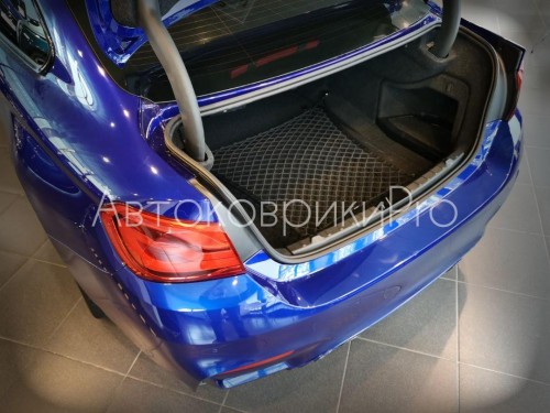 Сетка в багажник BMW 4 серии 2013-2020 Эластичная текстильная сетка горизонтального крепления, препятствующая скольжению и перемещению предметов в багажном отделении автомобиля.