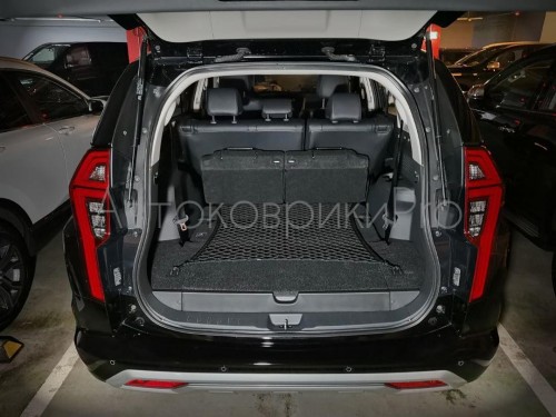 Сетка в багажник Mitsubishi Pajero Sport 2016- Эластичная текстильная сетка горизонтального крепления, препятствующая скольжению и перемещению предметов в багажном отделении автомобиля.