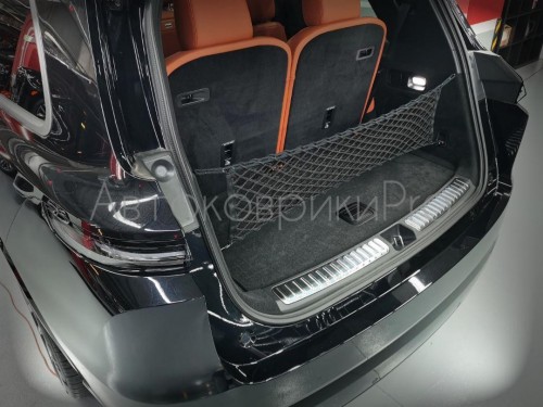 Сетка в багажник LiXiang L9 2022- Эластичная текстильная сетка вертикального крепления, препятствующая скольжению и перемещению предметов в багажном отделении автомобиля.