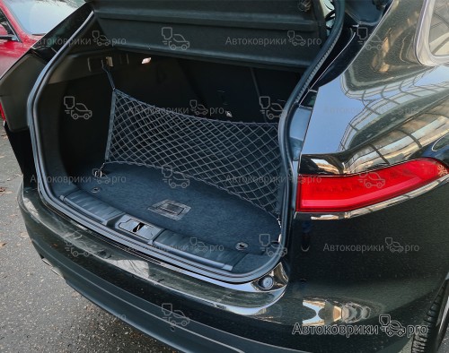 Сетка в багажник Jaguar F-Pace 2016- Эластичная текстильная сетка вертикального крепления, препятствующая скольжению и перемещению предметов в багажном отделении автомобиля.