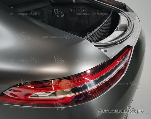 Сетка в багажник Mercedes-AMG GT 2014- Эластичная текстильная сетка вертикального крепления, препятствующая скольжению и перемещению предметов в багажном отделении автомобиля.