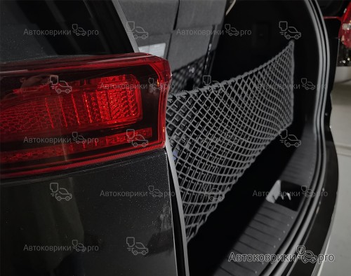 Сетка в багажник Hyundai Staria 2021- Эластичная текстильная сетка вертикального крепления, препятствующая скольжению и перемещению предметов в багажном отделении автомобиля.