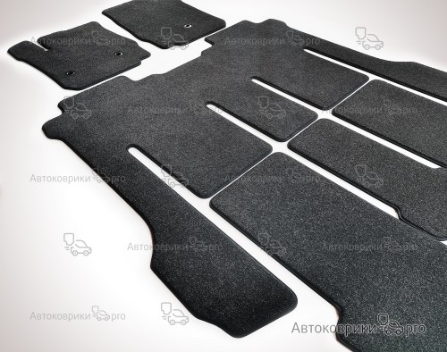 Коврики в салон Hyundai Grand Starex H-1 2007-2021 Комплект текстильных ковриков черного, серого, бежевого или коричневого цвета. Основа из термопластичной резины обеспечивает полную водонепроницаемость и защиту. Возможен заказ одного или более ковриков из комплекта.