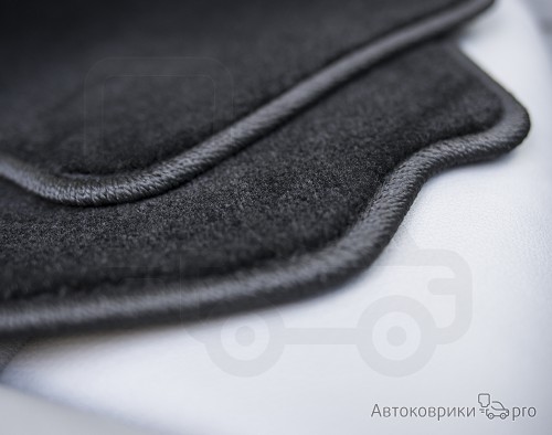 Коврики текстильные для Ford Mondeo 2014-2022 Комплект текстильных ковриков черного, серого или бежевого цвета. Основа из термопластичной резины обеспечивает полную водонепроницаемость и защиту. Возможен заказ одного или более ковриков из комплекта.